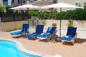 Pool area - patio extended behind and new privacy fencing installed at the front
