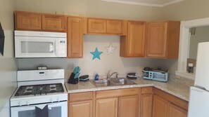 kitchen stocked with all cookware needs