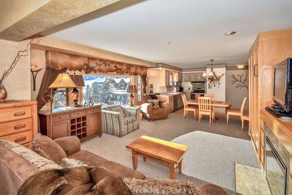 Spacious open floor plan, sun filled south facing condo with spectacular views of the ski runs, mountain village and ski resort.