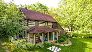 Enjoy the porch overlooking the pond.