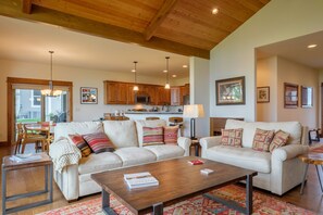 The kitchen, dining room, and living room offer a great flow to have the entire family in one space