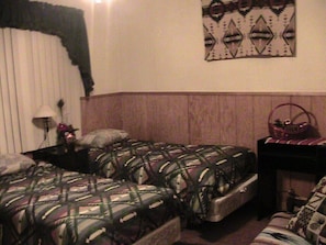 Large bedroom #1 with 2 twin beds and fold out couch