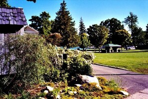 View of park & bay with rock garden in the foreground
