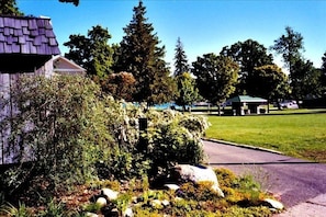 View of park & bay with rock garden in the foreground