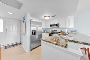 The kitchen is fully stocked and has been upgraded with stainless steel appliances!