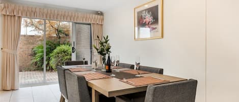 Spend quality meal times in this dining room located next to the kitchen.