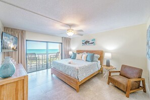 Serene master suite with a king bed, ocean views, and a private balcony.