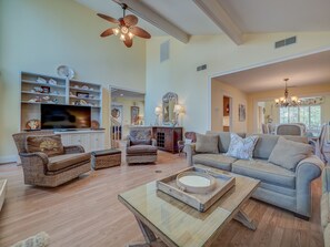 The family room is open to the dining room and entrance foyer 