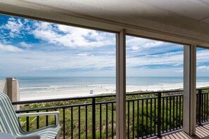 View from oceanfront balcony of uncrowded unspoiled Crescent Beach.