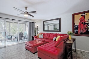 Living Room with huge sliders to the patio (next to babbling creek)