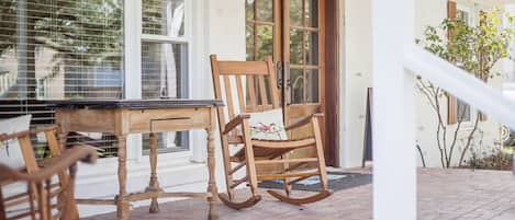 come and relax on the front porch and watch the world go by