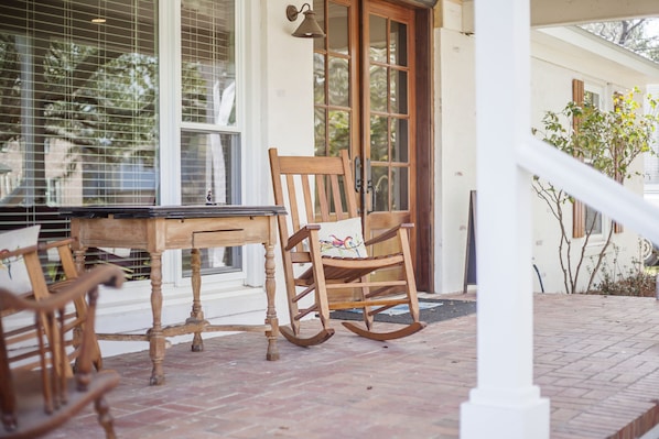 come and relax on the front porch and watch the world go by