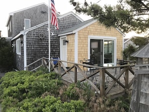 Oversized patio slider leads to large front deck.