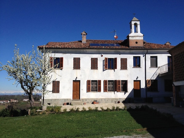 The house with the bell tower on the roof