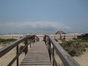 few steps from the house to the walk bridge to the beach