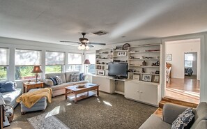 The living room is perfect for family time, relaxing, or entertaining