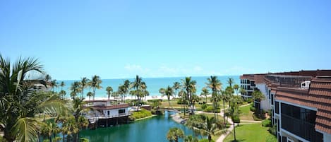 This is the view from the lanai overlooks Gulf, Lagoon, Pool.