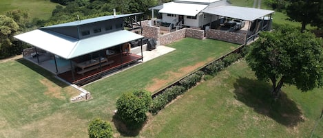 The cottage and barn connected by our courtyard and outdoor entertainment cinema