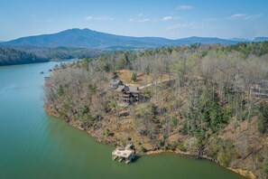 Built on 4 lakefront lots for ultimate privacy.