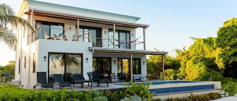 Wall of Windows that opens to the Caribbean Sea with magnificent ocean views!