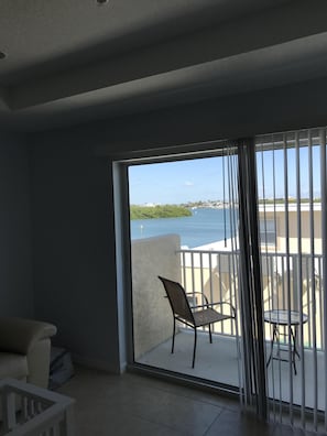 Private balcony with 8'slider and water view.Nice place to start the morning.