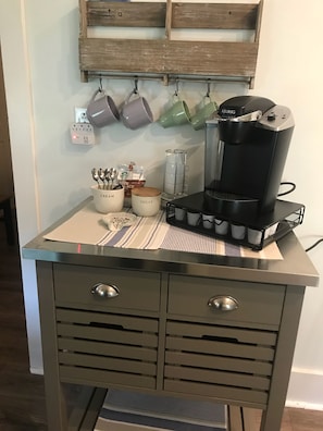 Keurig coffee station. Also has a drip coffee maker and electric kettle. 