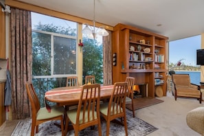 Seated dining for six in the combination living dining area with fireplace. 