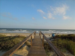 cross bridge from beach house to the beach within less a minute walking distance