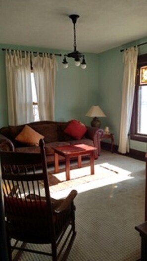 Living room, south view, stained glass insert