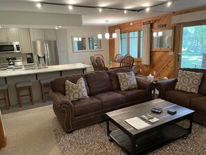 Kitchen opens up into a spacious dining and living room area.