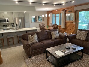 Kitchen opens up into a spacious dining and living room area.