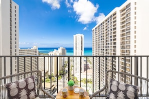 Enjoy having coffee on your balcony with this beautiful ocean view.