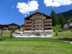 Cloud, Sky, Plant, Building, Tree, Mountain, Natural Landscape, Window, Land Lot, Wood