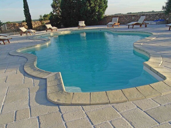 Swimming Pool, Property, Azure, Water, Flagstone, Vacation, Leisure, Rock, Tourism