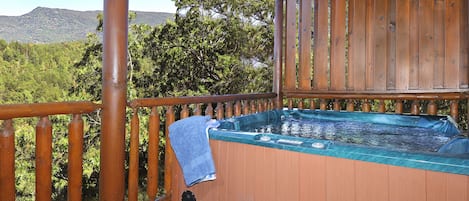 Relax in your Hot Tub overlooking the Smoky Mountains.