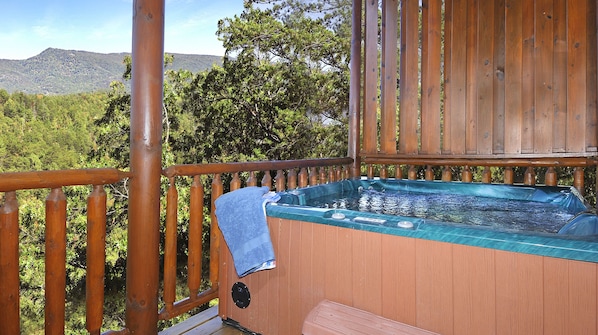 Relax in your Hot Tub overlooking the Smoky Mountains.