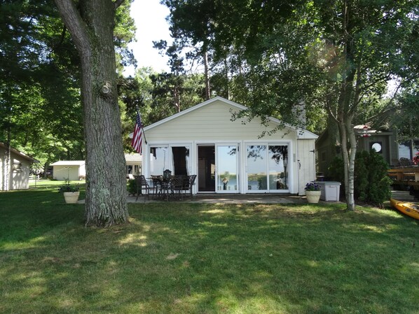 View of cottage from lake edge