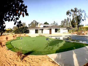Putting green and pool