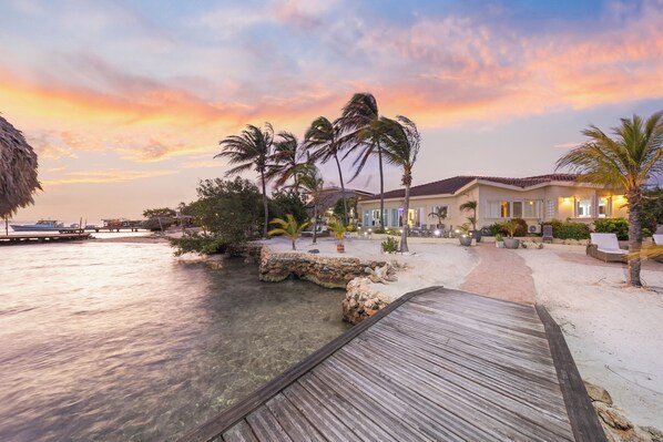 Insane ocean front villa with a private pier and outdoor kitchen