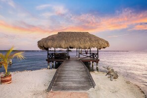 Discover serenity at our private pier on the water, where each sunset paints a masterpiece over the tranquil waves, offering a secluded sanctuary for quiet reflection and unforgettable moments.