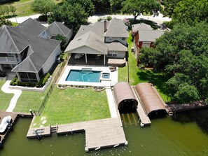 swim dock with bumpers and tie-offs.  Boat lift is currently setup for V-Hull