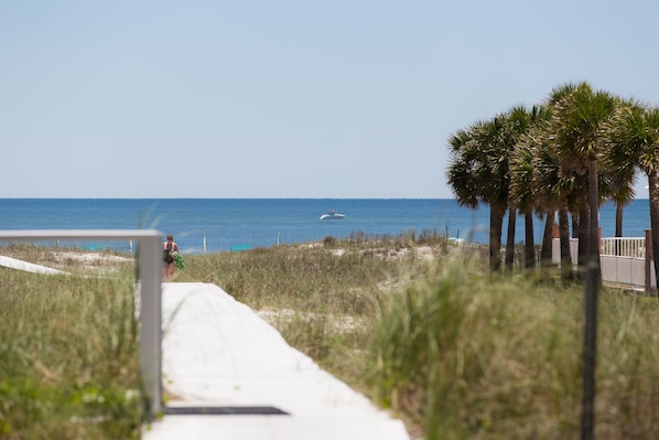 Boardwalk to the beach.  Distance is about the length of a football field.
