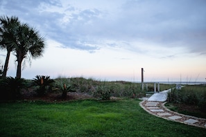 Backyard access with Boardwalk that leads directly to the beach! 