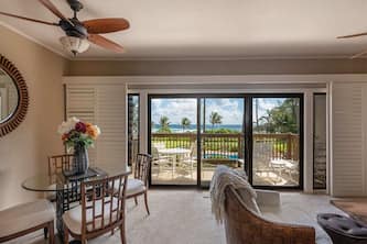 East Kauai w/ocean view lanai, open kitchen, WiFi, ceiling fans, TV, DVD–Kaha Lani 209