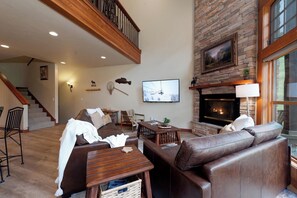 Main Living Space - TV, Deck, Gas Fireplace and slope views
