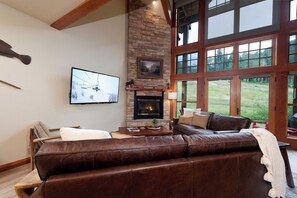 Main Living Space - TV, Deck, Gas Fireplace and slope views