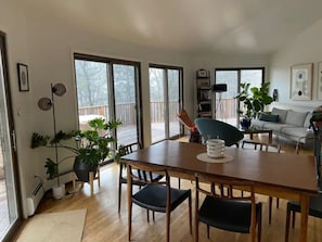 Dining area adjacent to living room and kitchen. Table can seat up to 10. 