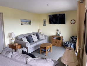 Living Room with a queen sleeper sofa.