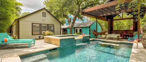 Beautiful Backyard Oasis with pool, hot tub and covered dining area!