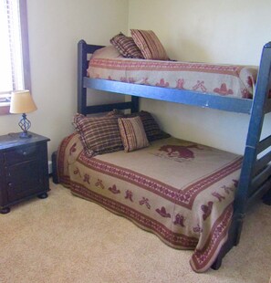 Kids Bedroom.  Double bunk and a twin bunk